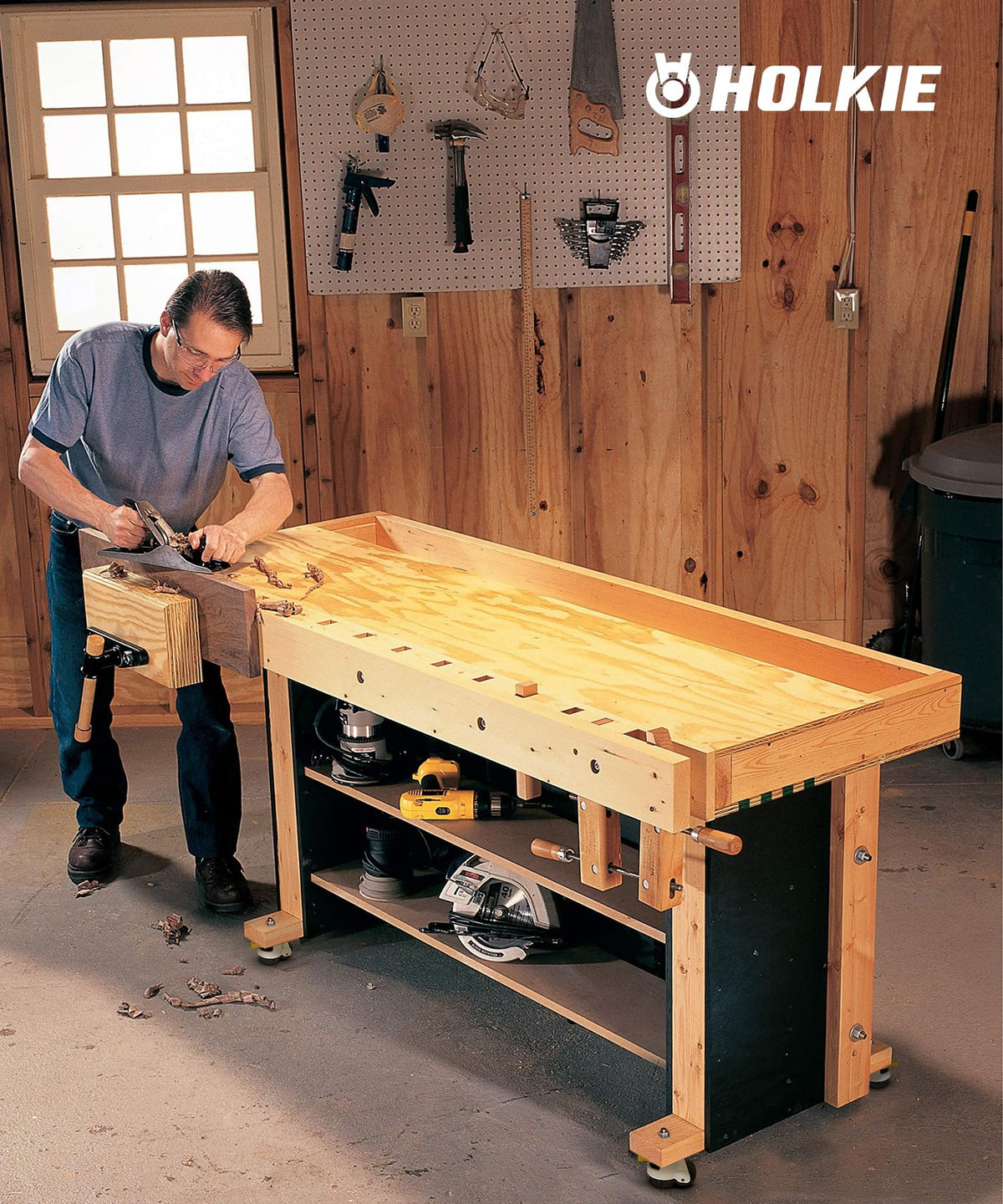 Woodworking workshop scene: wooden workbench fitted with HOLKIE heavy‑duty threaded‑stem leveling casters for wood shop equipment